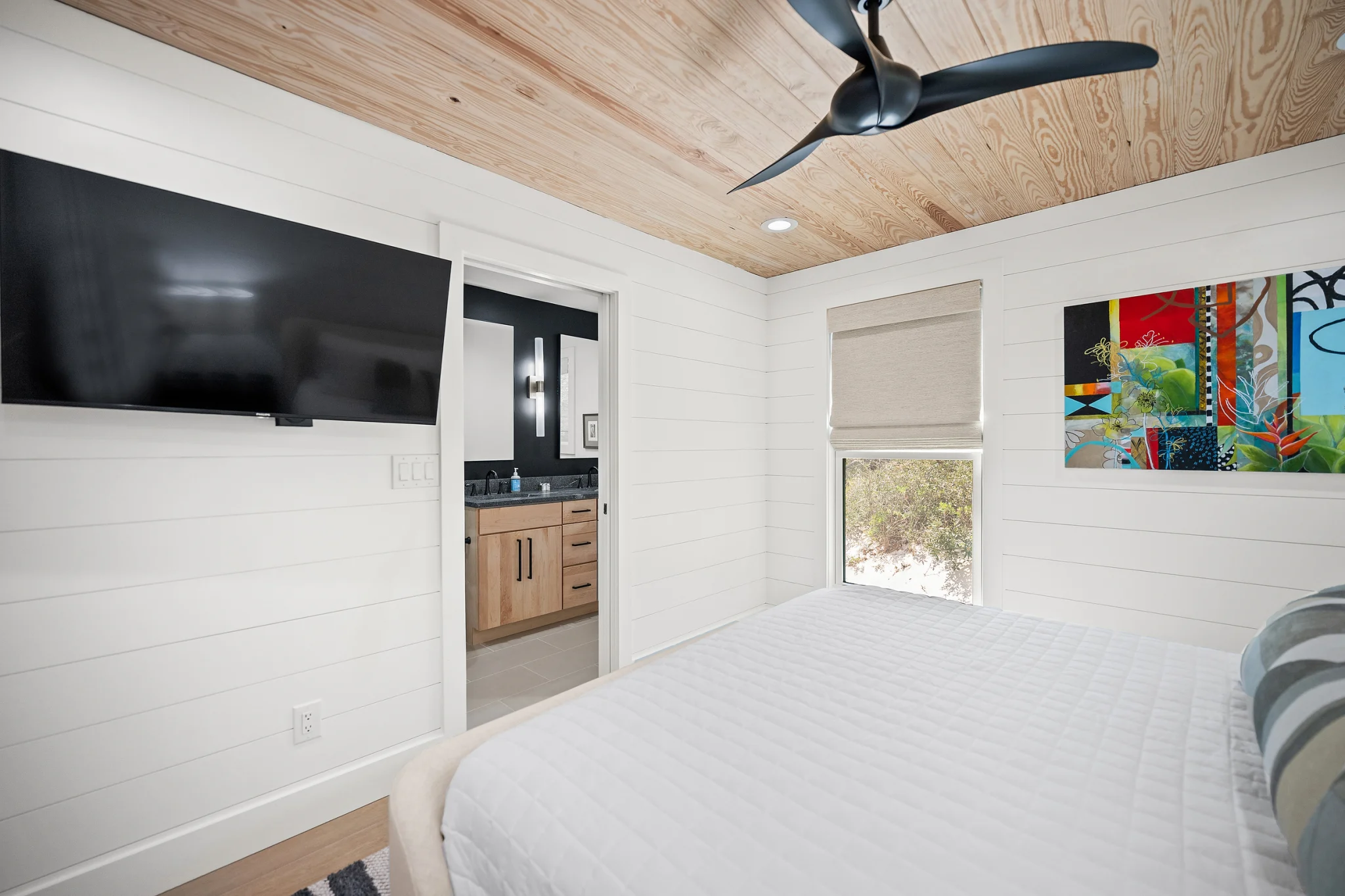 Bedroom with TV and art, Love Shack