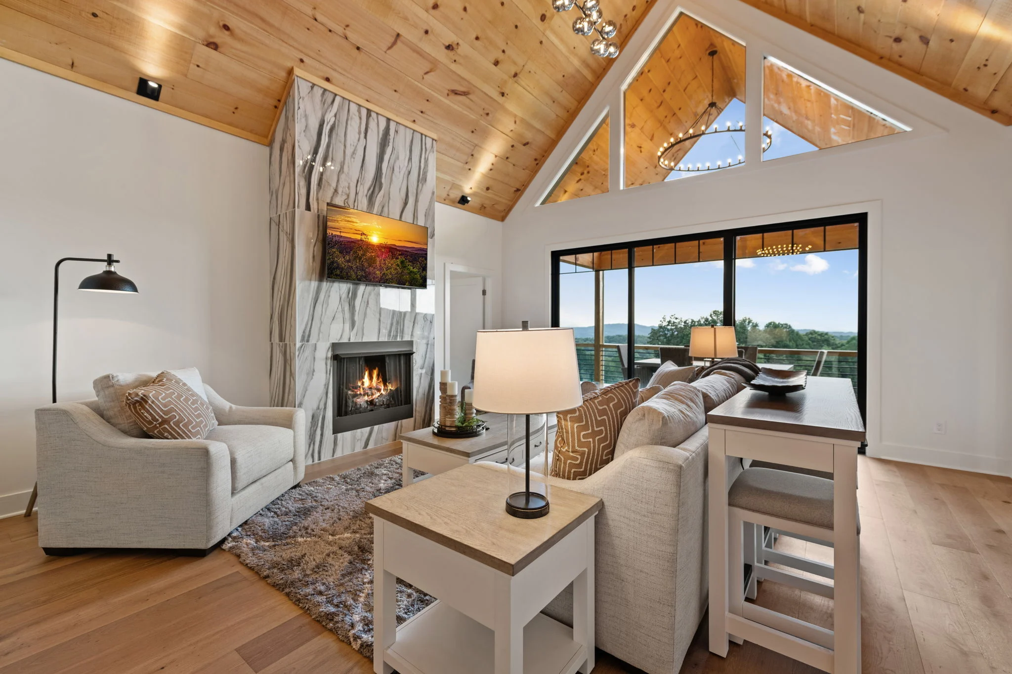Great room with a vaulted wood ceiling and stone fireplace, View Finder I