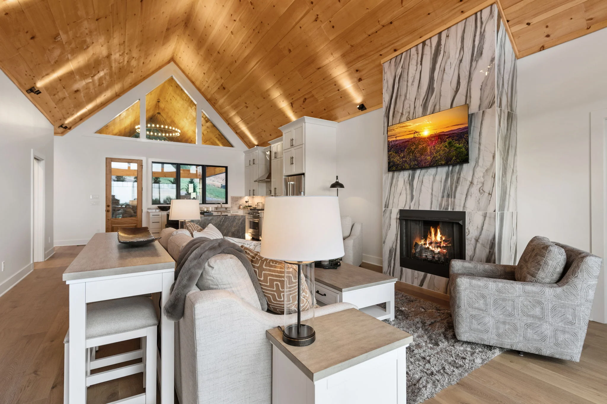 Great room with a vaulted wood ceiling and stone fireplace, View Finder I