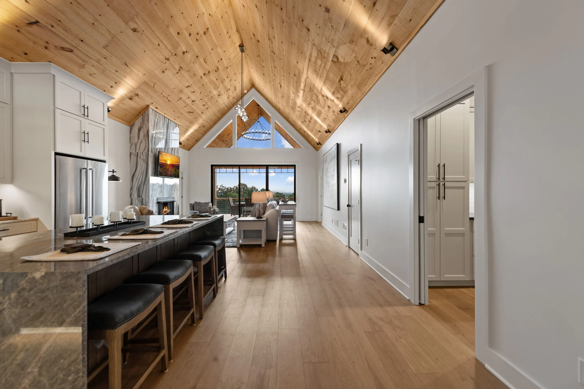 Chef's kitchen with a large stone island, View Finder I