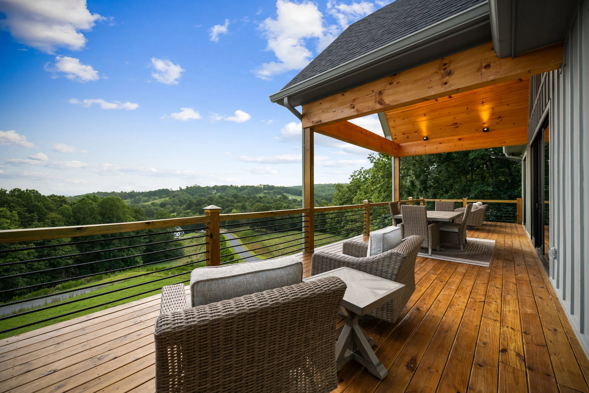 Covered deck with seating and mountain views, View Finder I