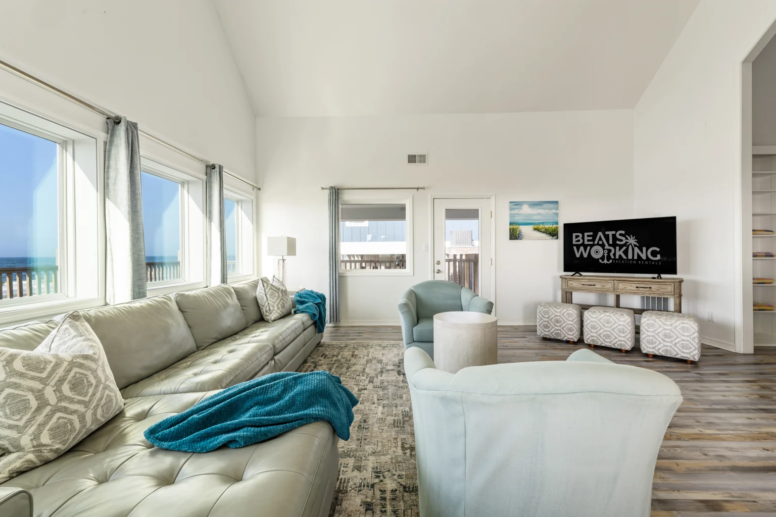Living room with sectional and TV, Sands of Time