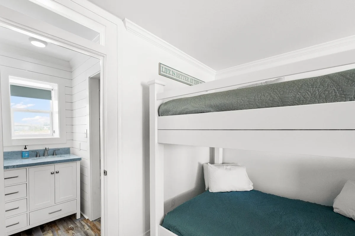 Bunk room with bathroom beyond, Sands of Time