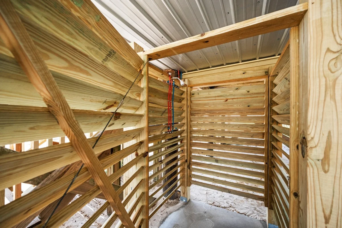 Outdoor shower under the house, Sands of Time