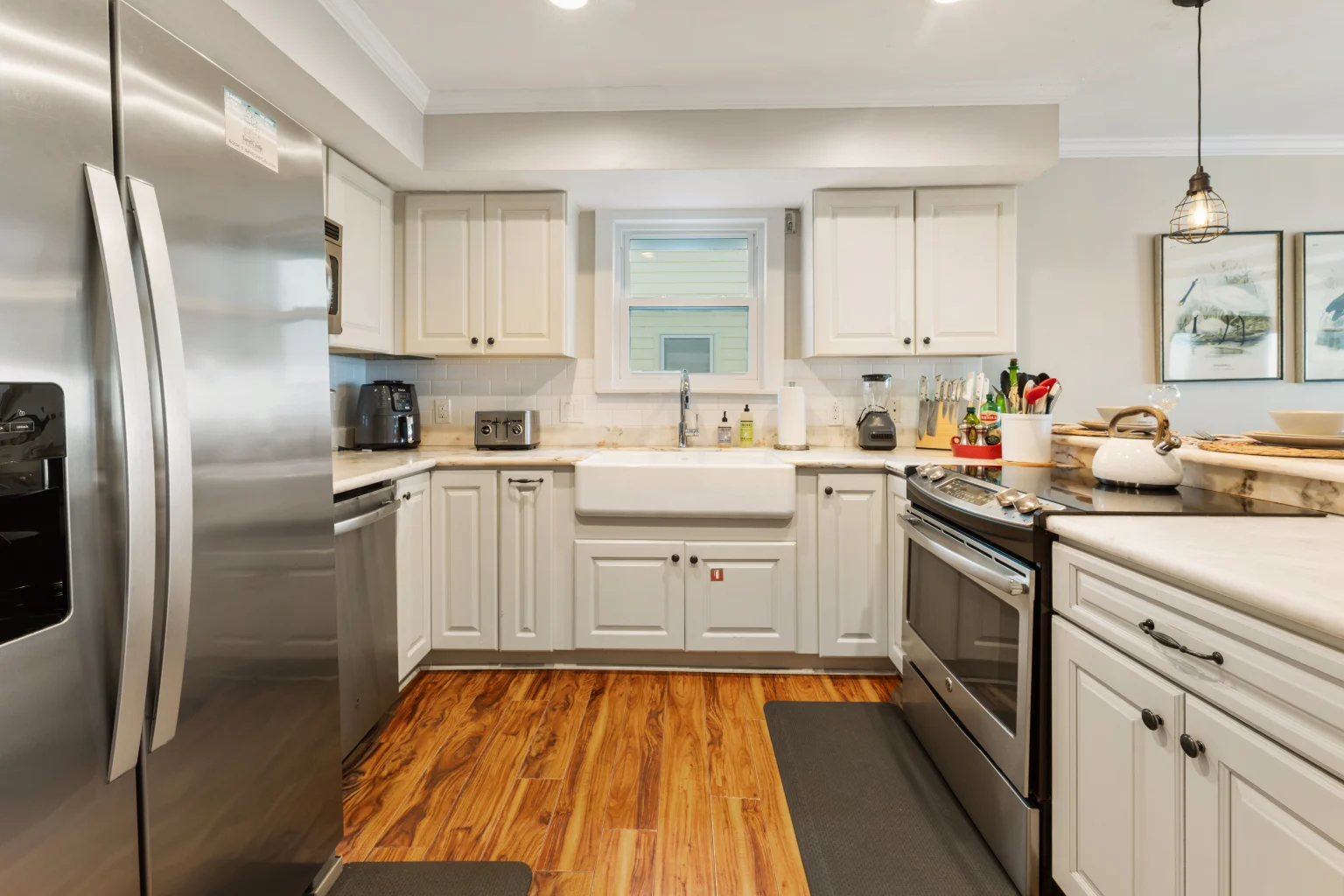 Kitchen with farmhouse sink and stainless appliances, SouthWind East
