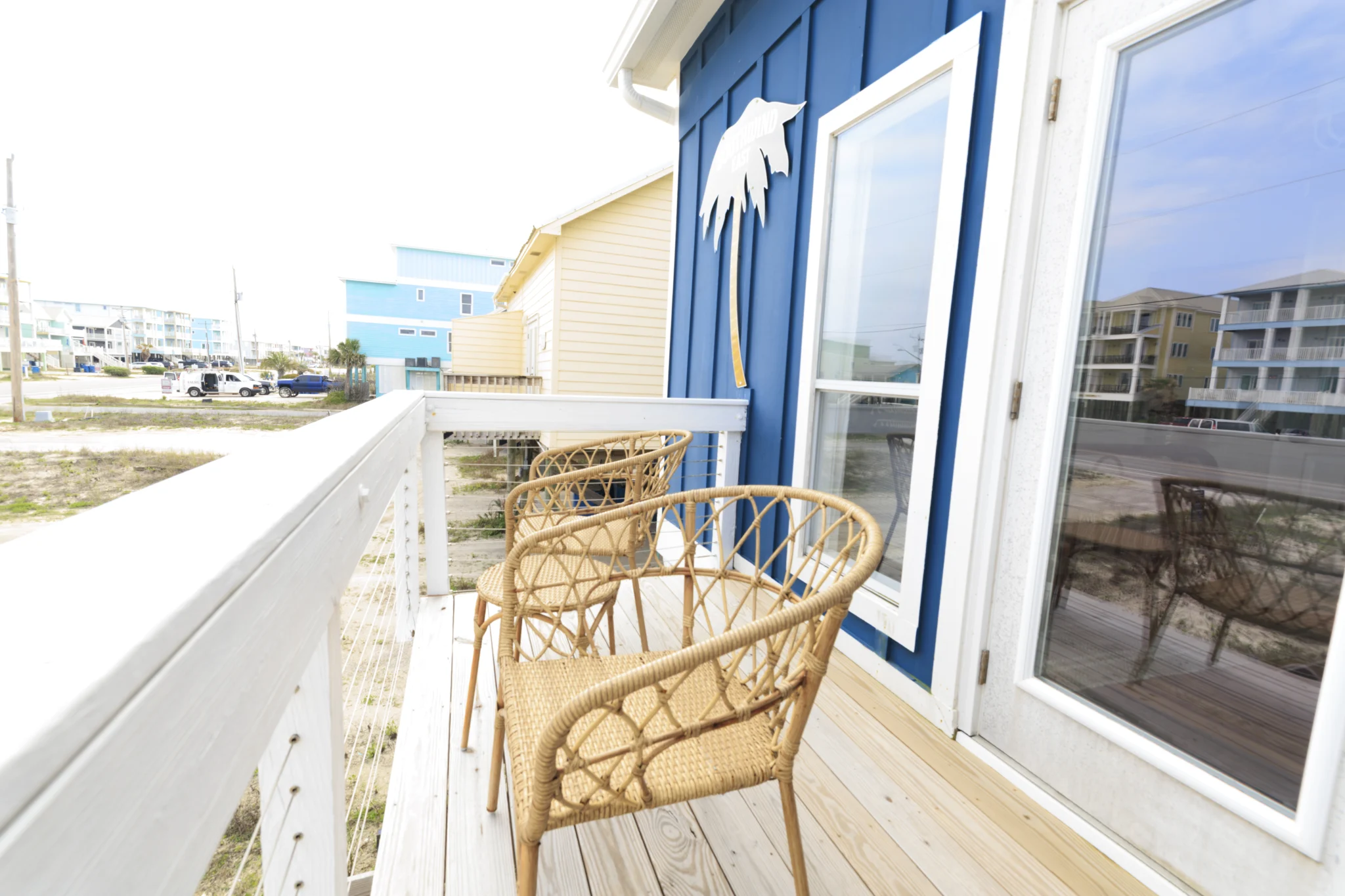 Side balcony with wicker chairs, SouthWind East