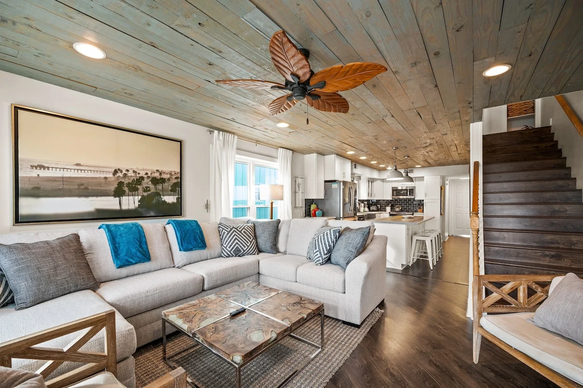 Sectional sofa and coffee table under a wood ceiling, SouthWind West