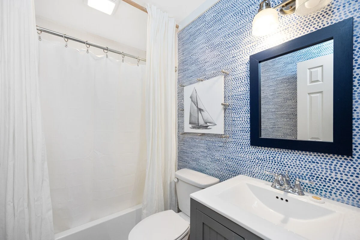 Bathroom with blue tile wall and tub, SouthWind West