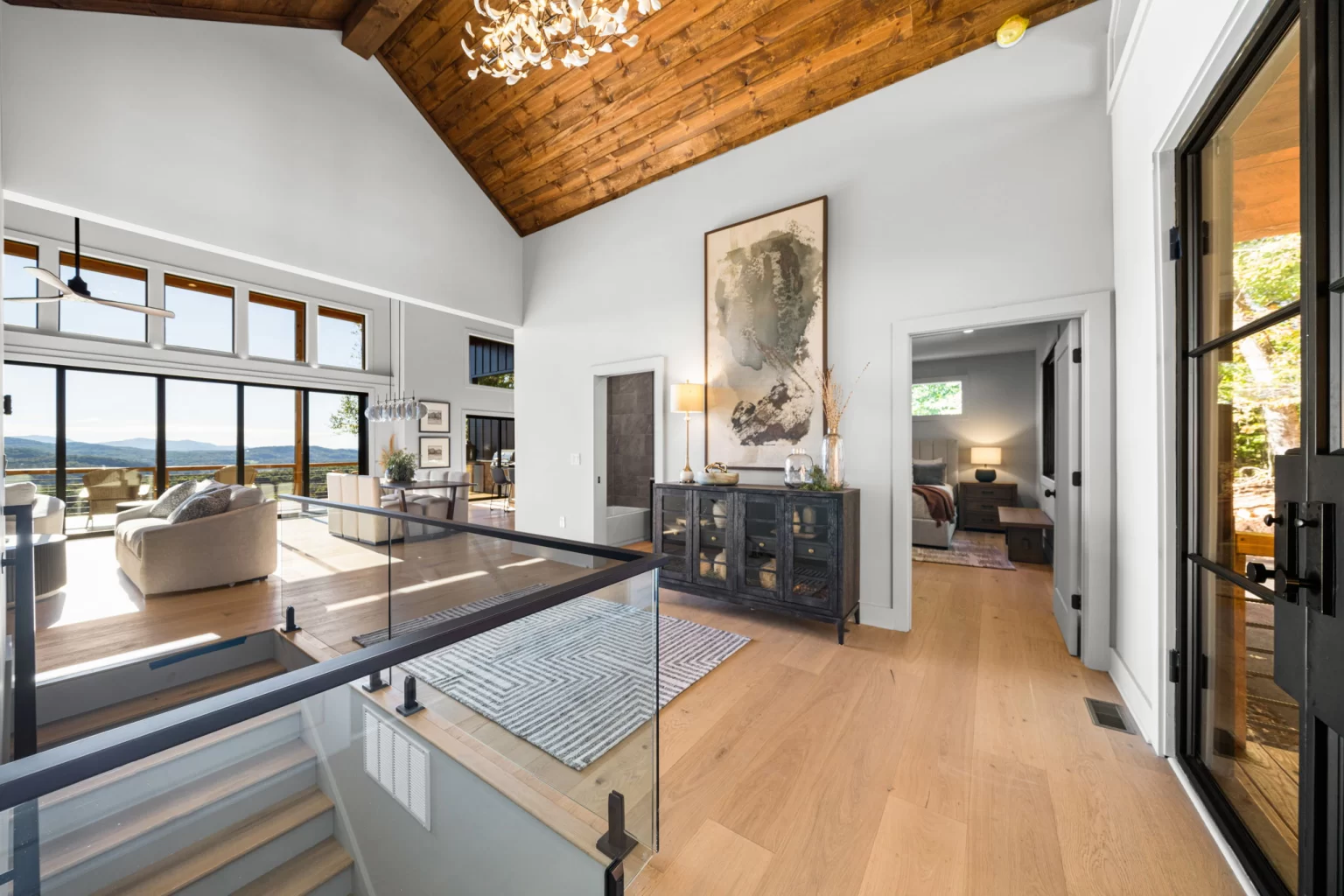 Entry and glass stair rail under the wood ceiling, View Finder II